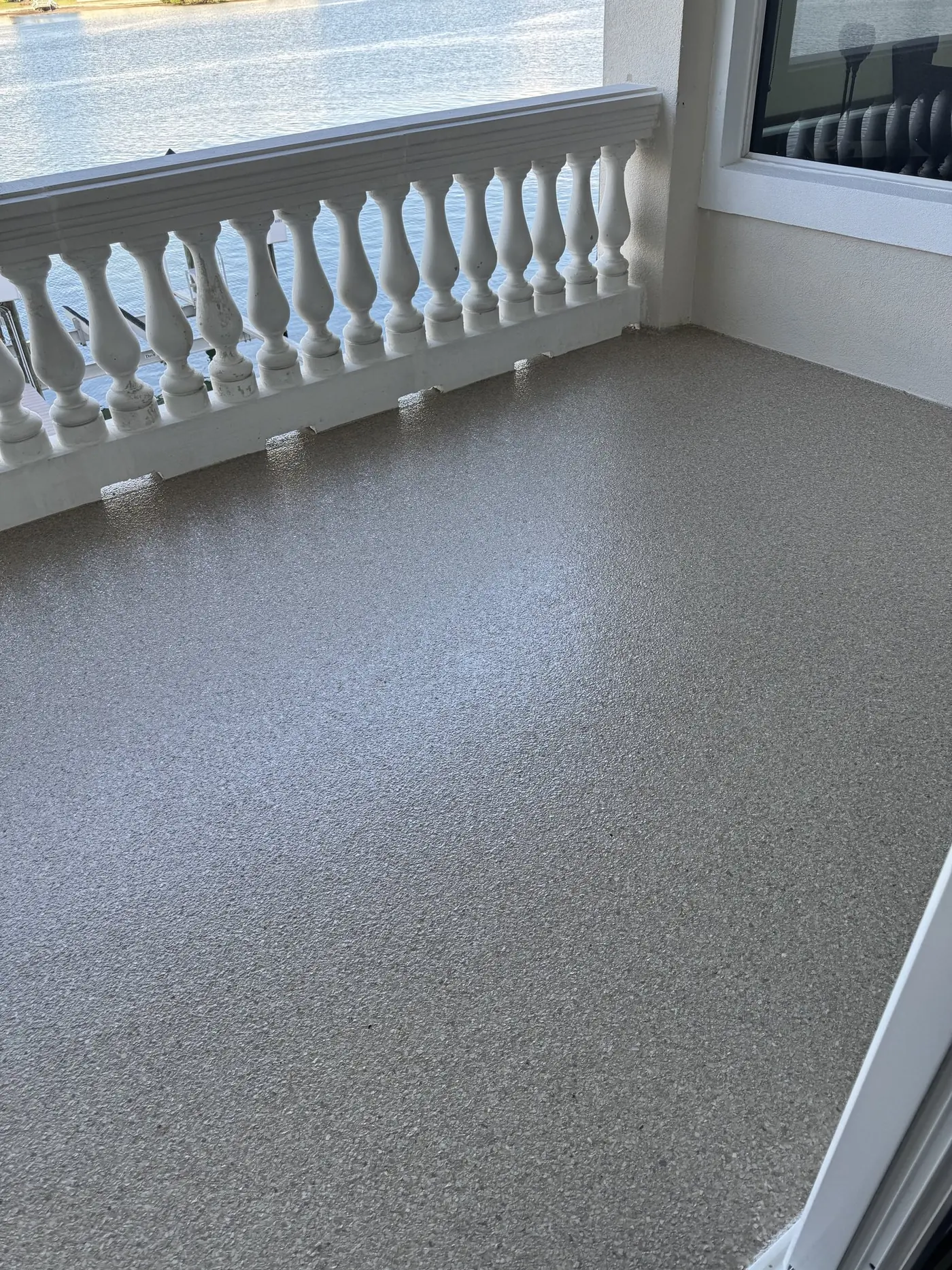 Ground concrete slab with cracks repaired before coating