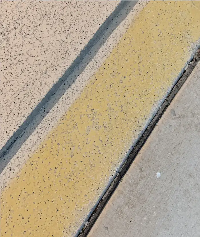 Yellowed UV damaged garage coating
