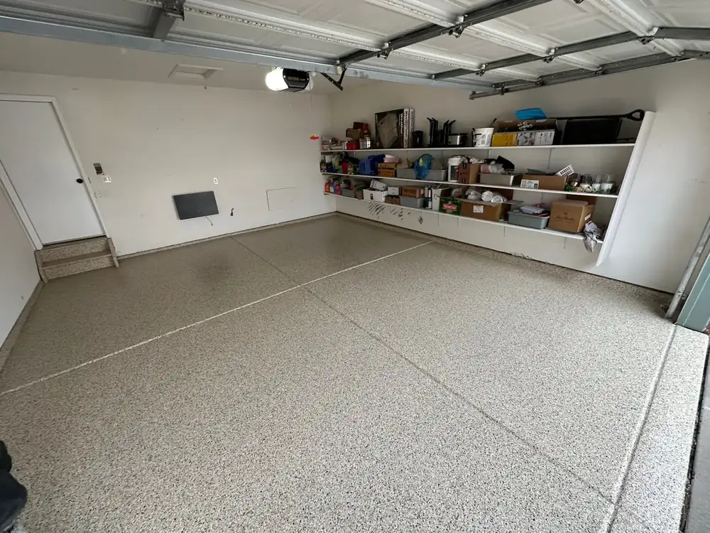 Creekbed flake garage floor with wall shelves